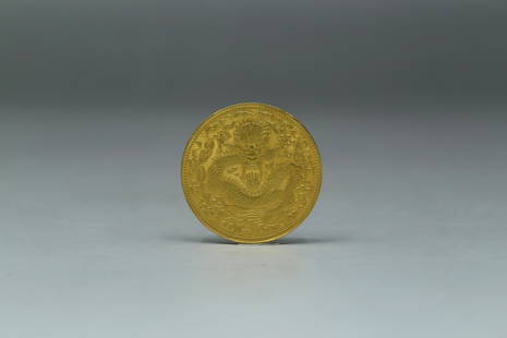 A Chinese Gold Coin: A Chinese Gold Coin. Diameter: 1.5".Weight: 37.14 g