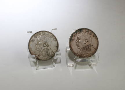 A Group of Two Chinese Silver Coins: A Group of Two Chinese Silver Coins. Diameter: 1.5"