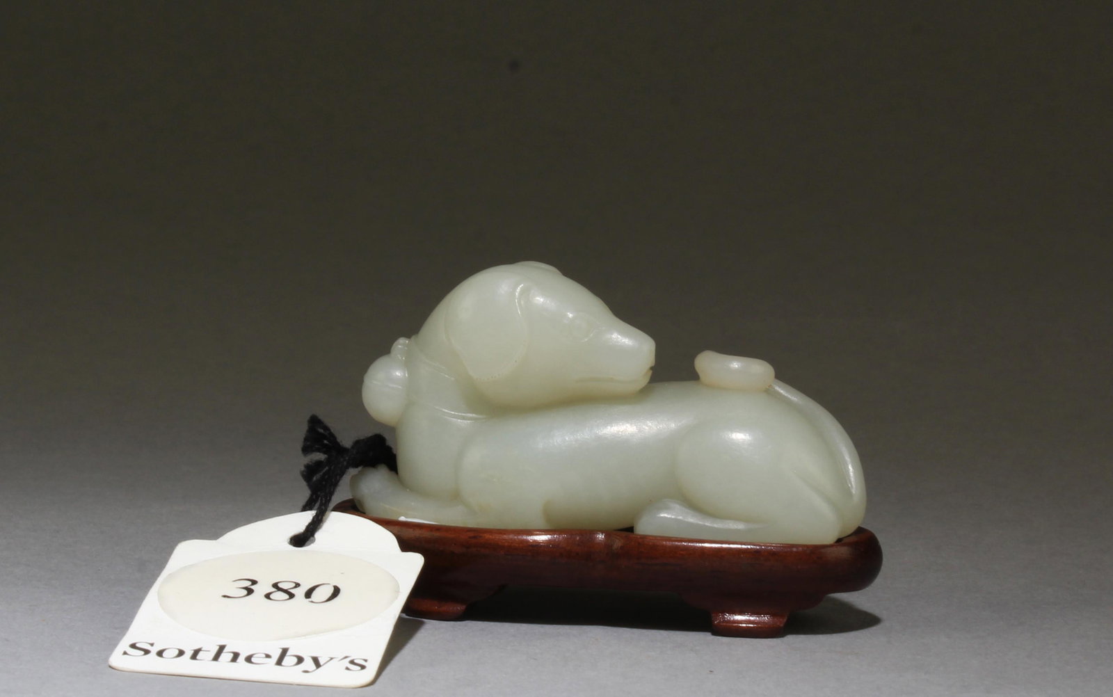 17th/18th Century Antique Chinese Carved Hetian Ja: Antique Chinese Carved Hetian Jade Dog Figurine. Comes fitted with a stand. Length: 2.25"