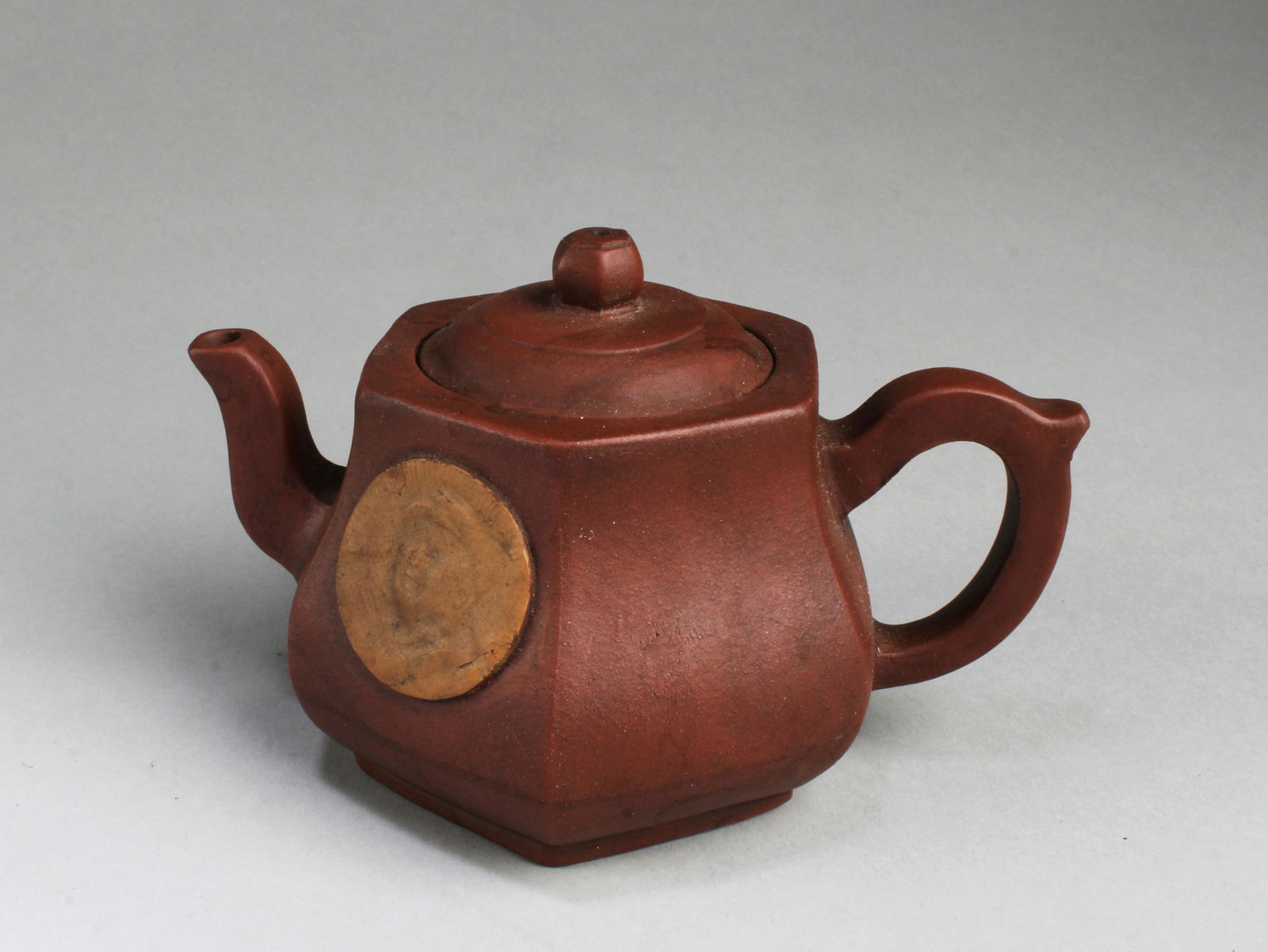 Chinese Zisha Teapot: Chinese Zisha Teapot. A mark is engraved at the base. Length: 7"
