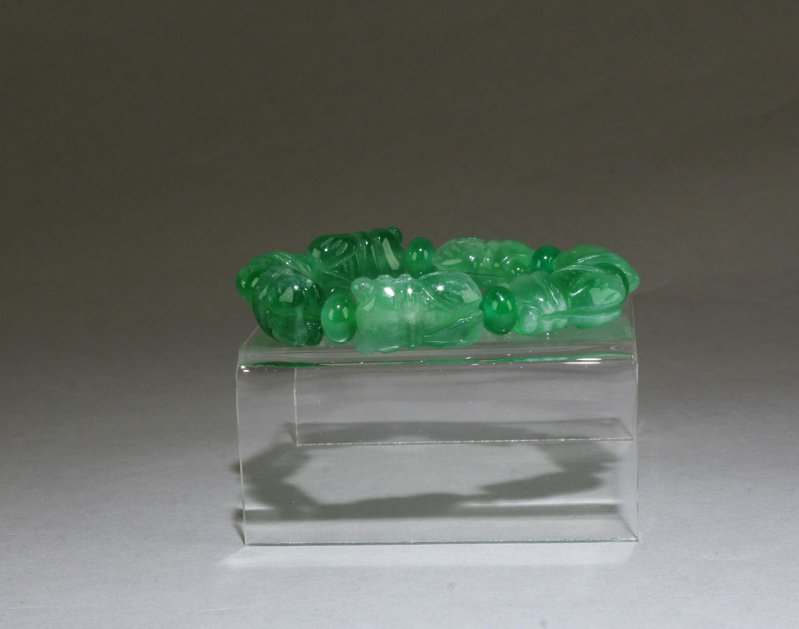 A Jadeite Jade Bracelet: A Jadeite Jade Bracelet. Diameter: 2.9"