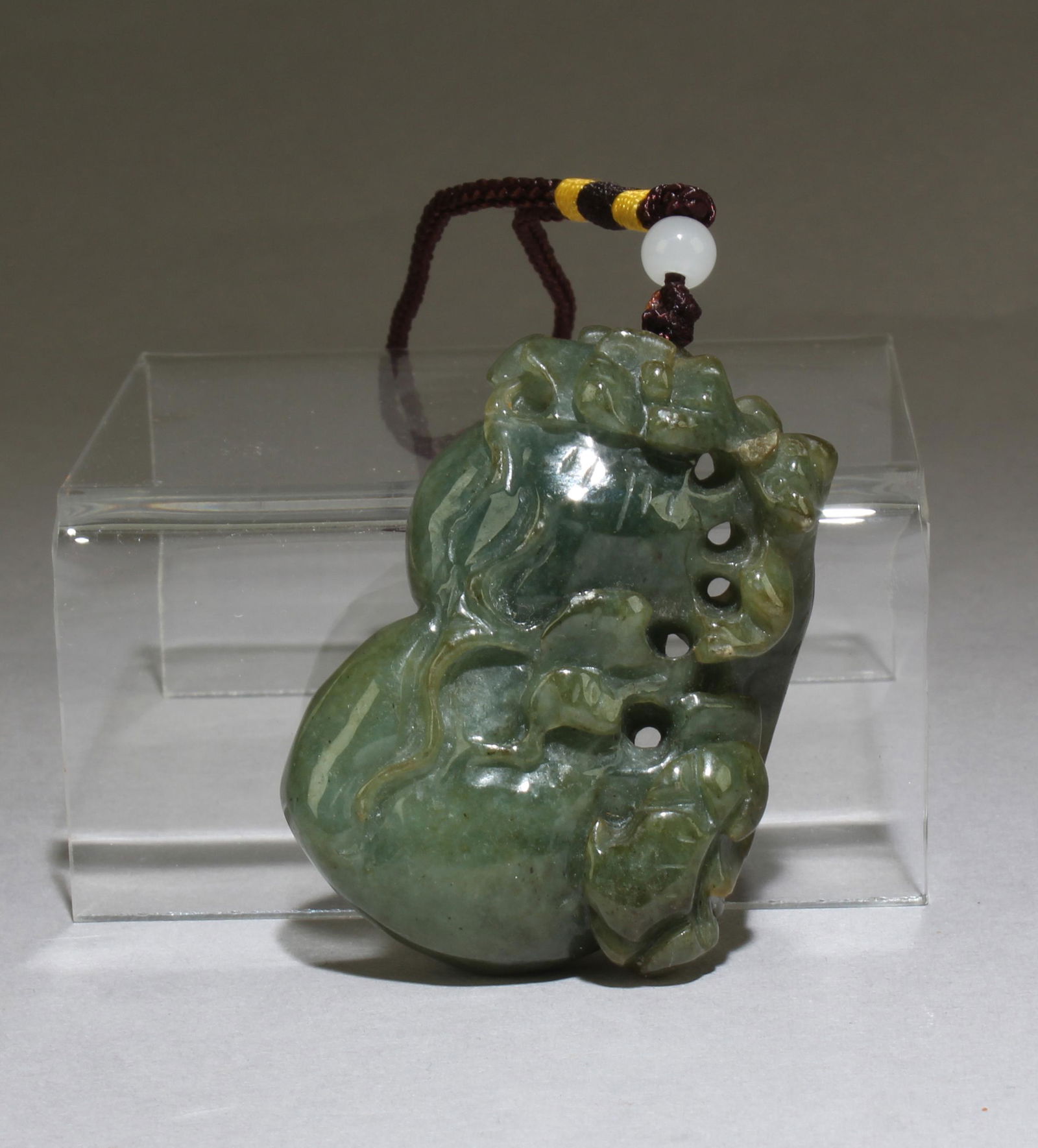 A Jadeite Jade Pendant: A Jadeite Jade Pendant. Height: 2.25"