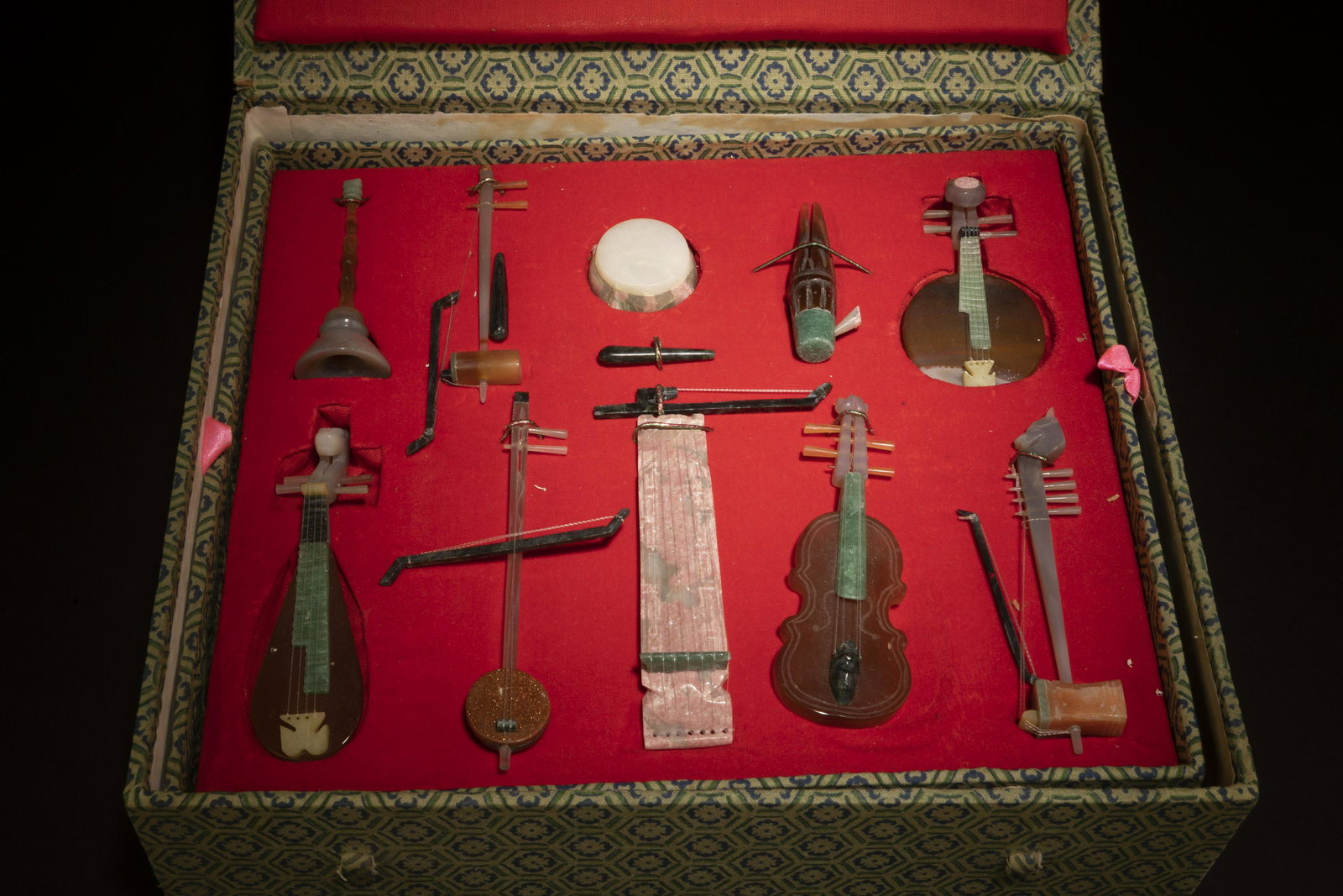 A Set of Jade, Agate and Gemstone Musical Instrume: A Set of Jade, Agate and Gemstone Musical Instrument Ornaments. comes fitted with a box. Of varying shapes and sizes. Box dimension: 12" x 10.5" x 4.25"