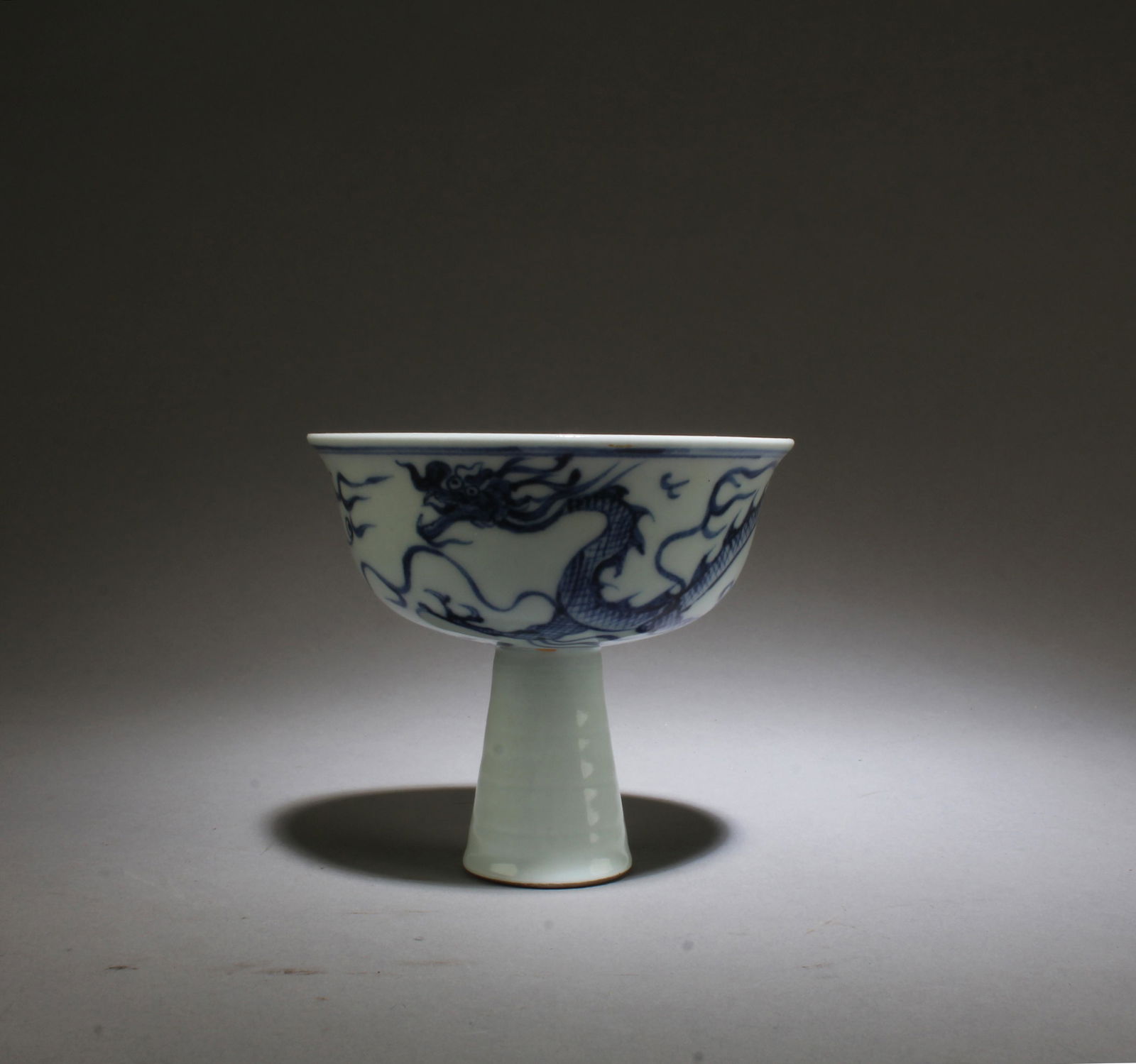 A Blue & White Stem Cup: A Blue & White Stem Cup. Diameter: 4" Height: 3.5"