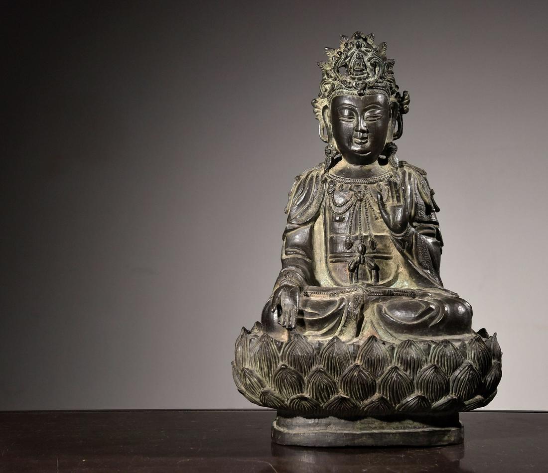 A Bronze Seated Guanyin Statue