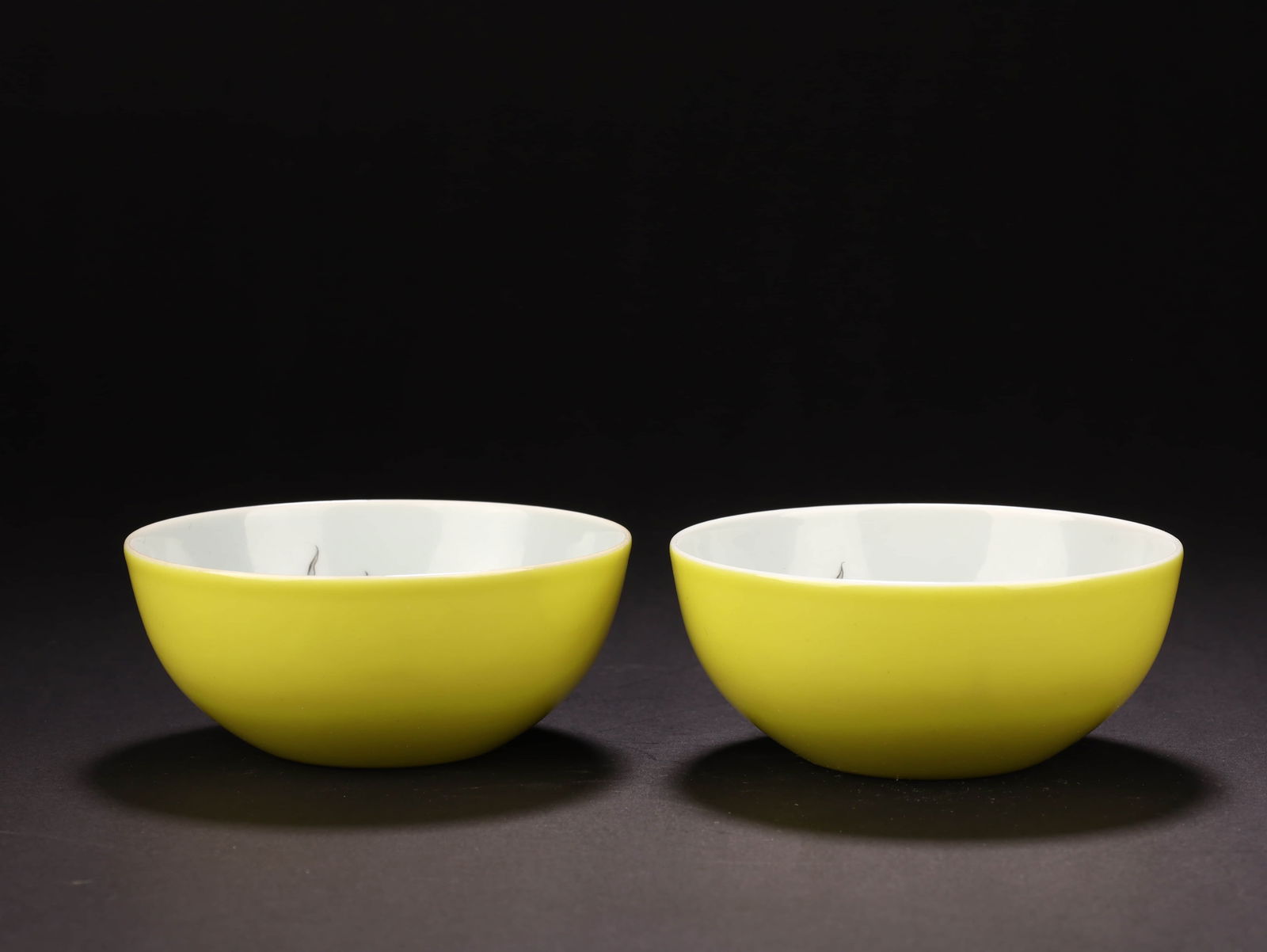 A Pair of Yellow-Glazed Fish Cups: A Pair of Yellow-Glazed Fish Cups. Height: 4cm Mouth Diam.:9.4cm