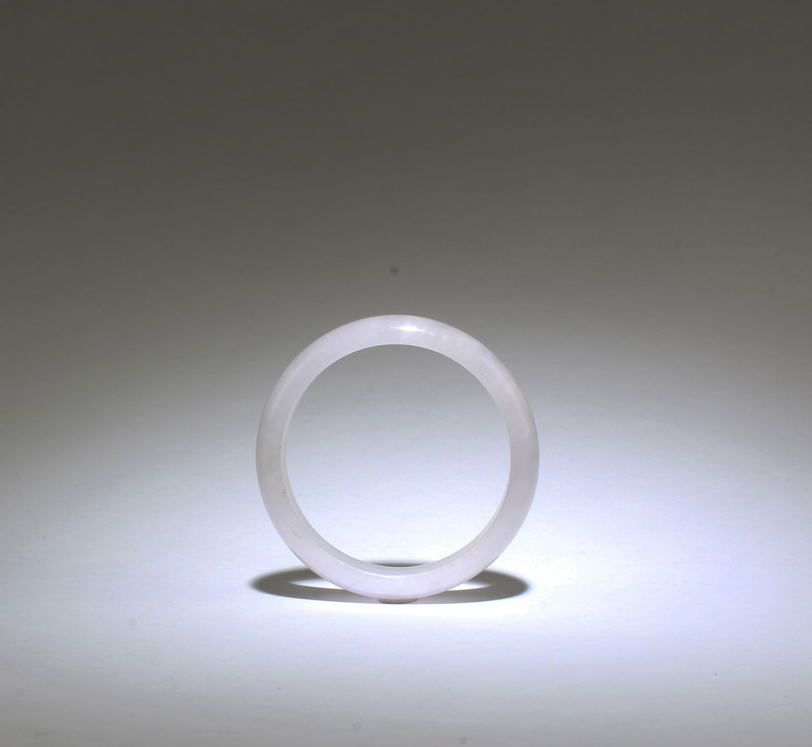 A Jadeite Like Bangle: A Jadeite Like Bangle. Inner Diameter: 2.25"