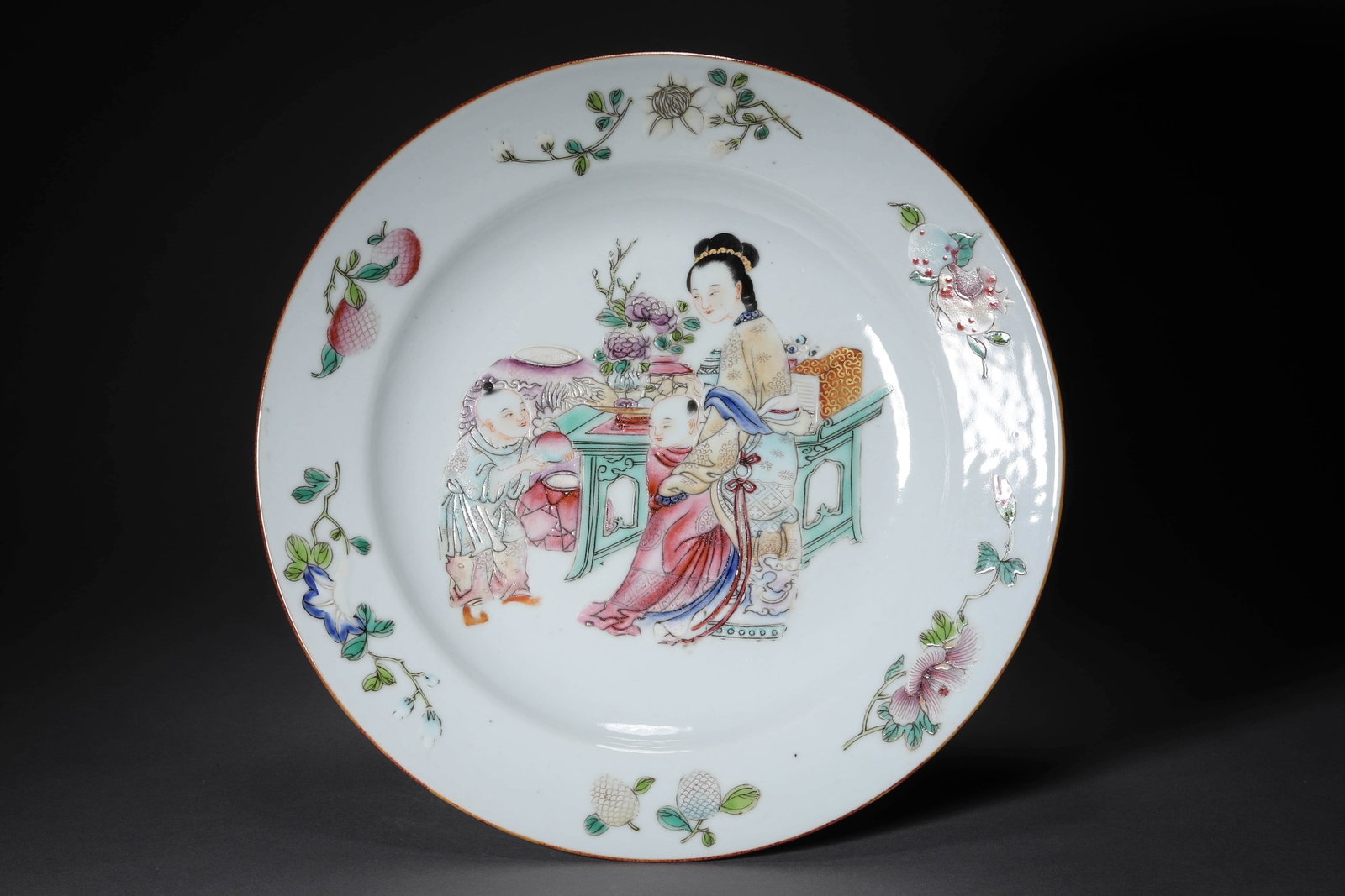 A Famille Rose Figure and Boy Plate: A Famille Rose Figure and Boy Plate. Width:22.5cm, Height:3cm, nan