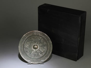 A Chinese Bronze Mirror