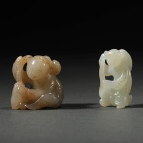 Two Jade Boy Carvings