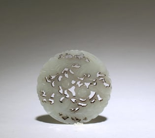 A Round Carved Jade Ornament
