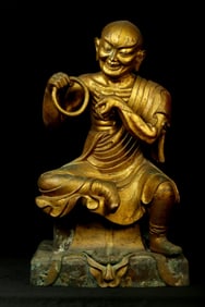 A Gilt Bronze Enlightened Monk Statue