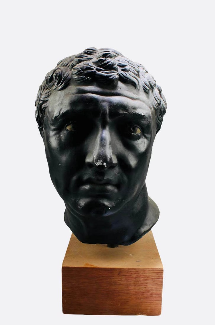 A Pottery Head Figurine: A Pottery Head Figurine, comes attached with a wooden stand. Height: 17.5" (Including stand)
