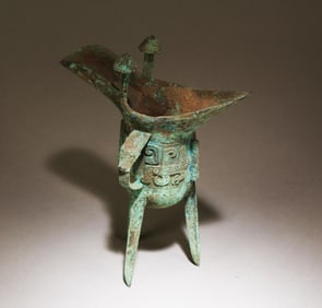 A Chinese Bronze Tripod Winecup