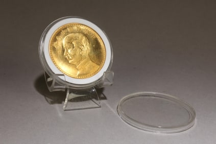 A Chinese Silver Inlaid Gold Coin