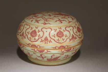 A Chinese Container with Red and Yellow Accents