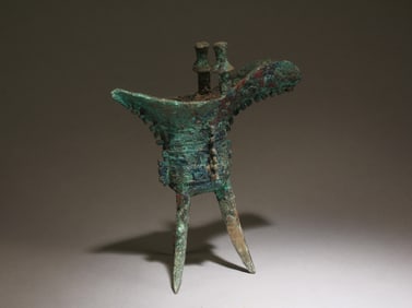 A Chinese Bronze Tripod Wine Cup