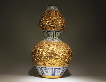A Chinese Blue and White Vase with Gilt Accents