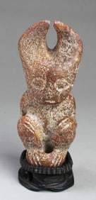 A Carved Jade Ornament with Wood Stand