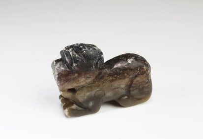 A Carved Jade Mythical Beast Figurine