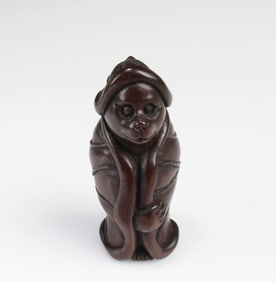 A Carved Wooden Figurine