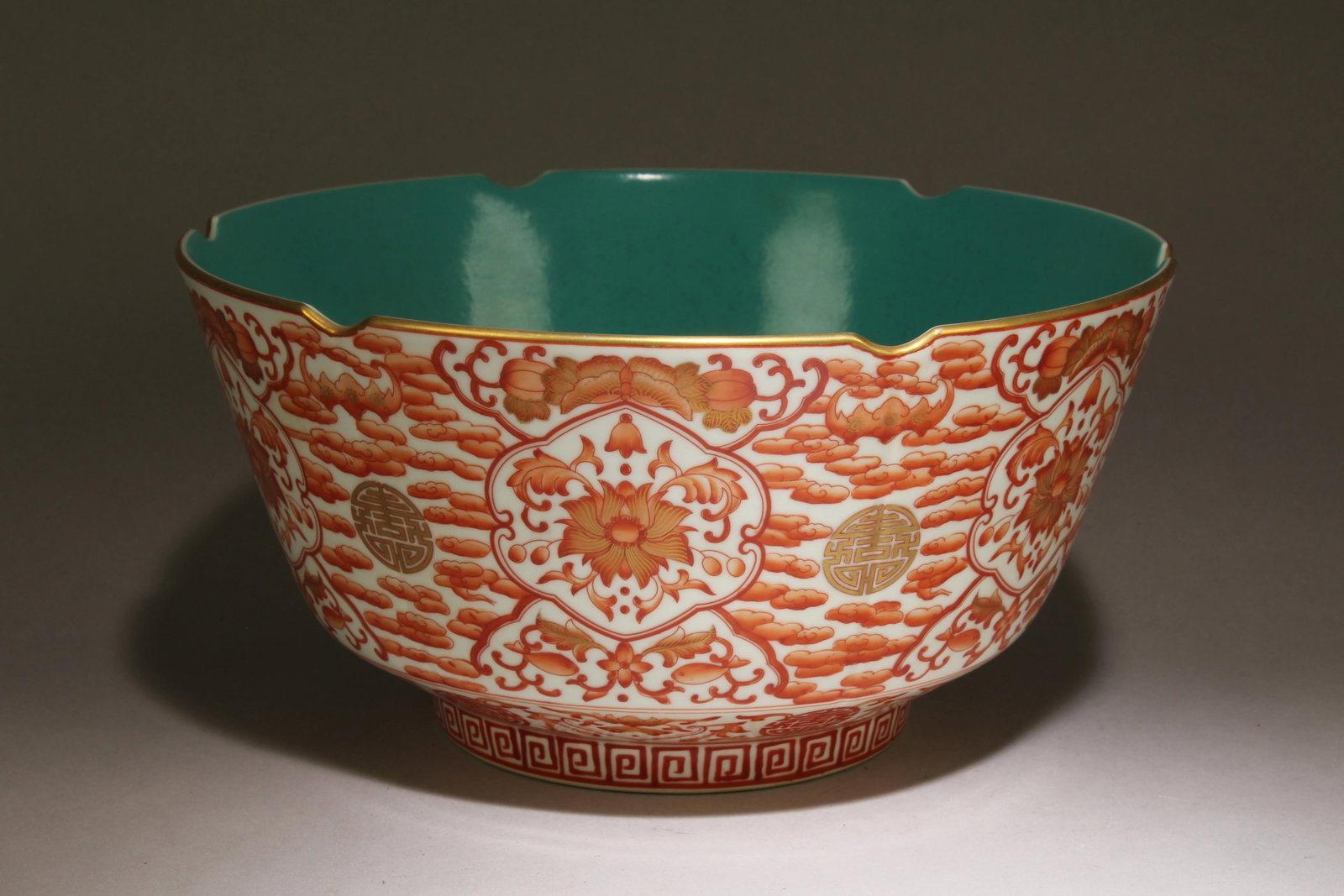 A Chinese Coral Colored Design with Torquoise Bowl: A Chinese Coral Colored Design with Torquoise Center Bowl with "Yongzheng" mark at base. Dimensions: 10" x 5.2".