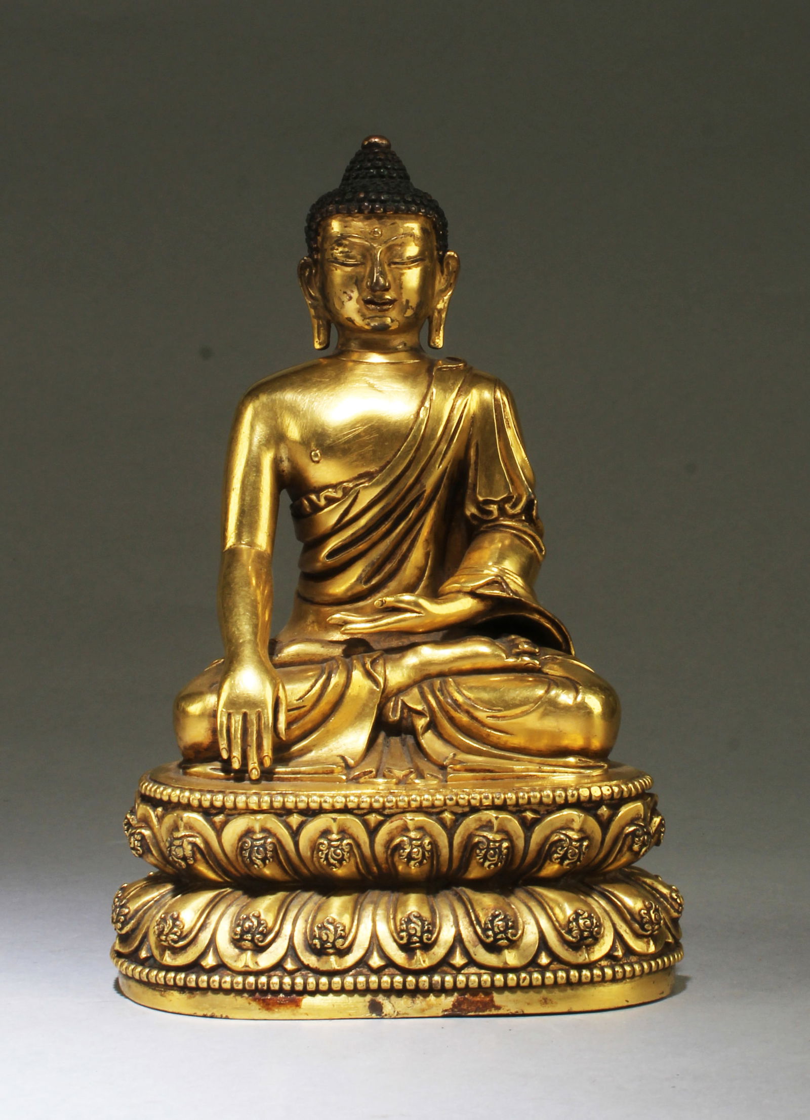 A Ming Dynasty Gilt Bronze Buddha Statue (1 of 7)