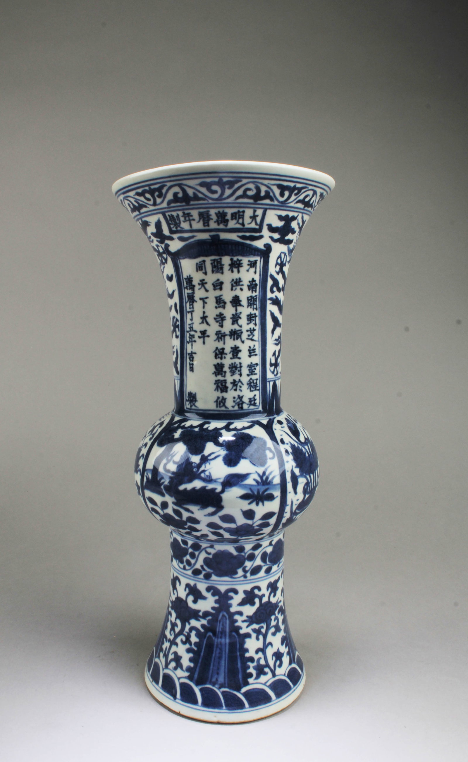 Chinese Blue & White Porcelain Vase: Chinese Blue & White Porcelain Vase. 'WanLi' mark. Height: 13.5"
