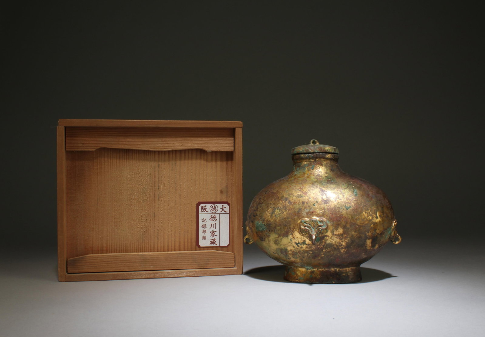 A Gilt Bronze Jar: A Gilt Bronze Jar. Dimensions: 6.4" x 5.5". Formerly collected by the noble Tokugawa family in the Kansai region of Japan. These goods were first hidden in a temple called Bodaiji in the Kansai region