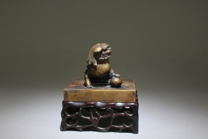 A Bronze Mythical Beast Figurine with Stand