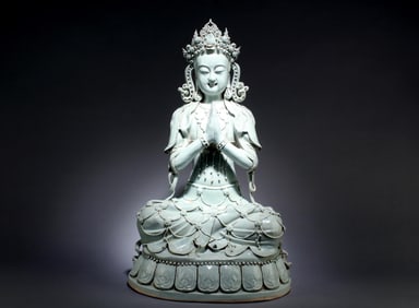 A Yingqing Porcelain Seated Guanyin Statue
