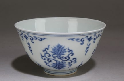 A Blue and White Chinese Cup with a Floral Pattern