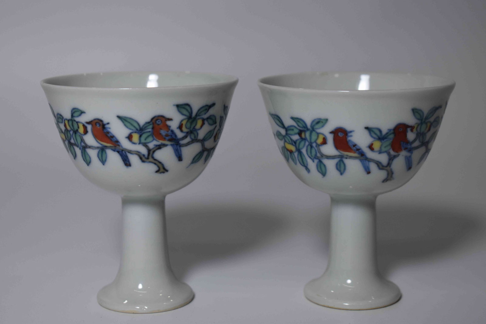 A Pair of Doucai Stem Cups: A Pair of Doucai Stem Cups. Height: 3.35in; Diameter: 2.68in