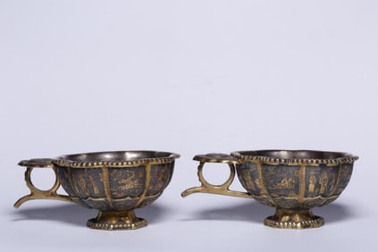 A Gilt Silver Pair of Cups
