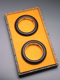 A Agarwood Pair of Gilt Silver Bracelets