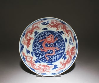 A Blue and White Plate with Red Dragon Motif