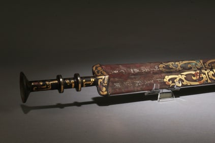 A Bronze Ornament with Gold Accents