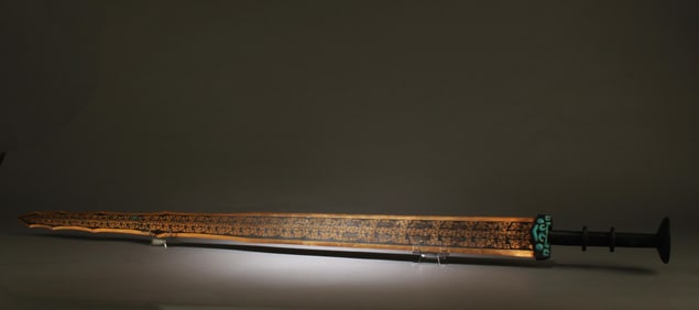 A Bronze Ornament with Gold Accents