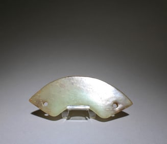 A Carved Jade Pendant