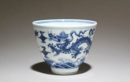 A Blue and White Cup with Dragon Motif