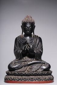 A Black Lacquered Buddha Ornament