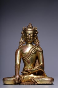 A Gilt Bronze Ornament of Vairocana Buddha
