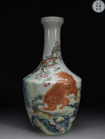 A Fencai Enamel Vase with Peach and Lion Motif