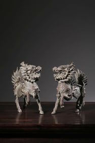 A Pair of Bronze Qilin Ornaments