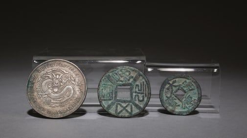 A Set of One Silver Coin and Two Bronze Coins