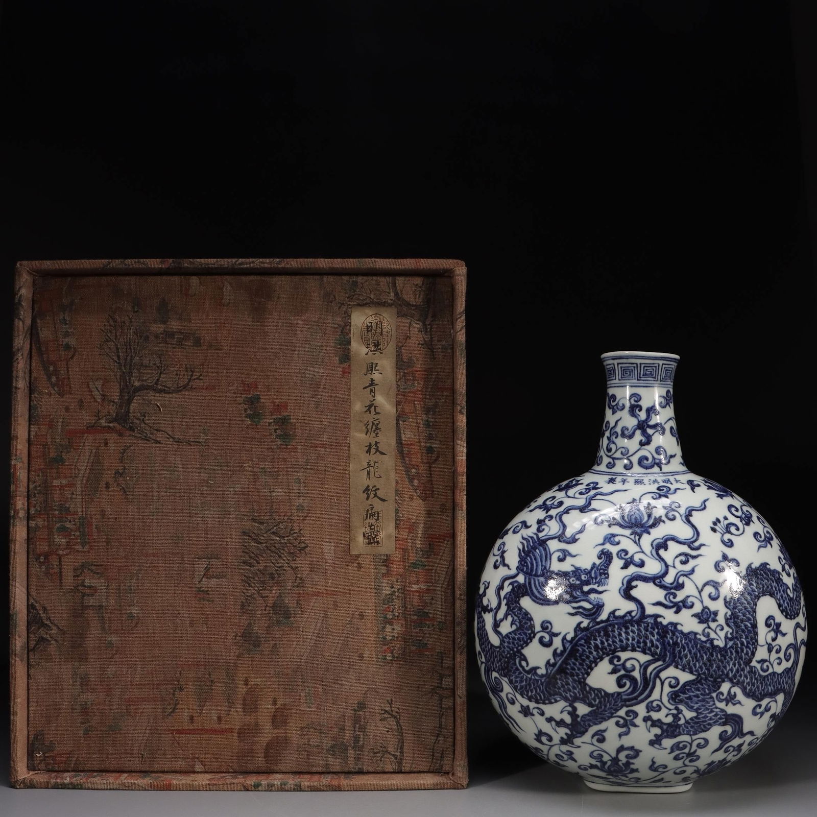 A Blue And White Flask: A Blue And White Flask. Height: 11.81in; Diameter: 9.06in; Weight: 5.12lbs