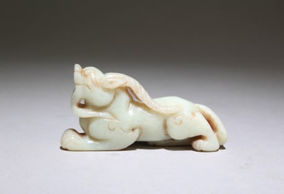 A Jade Mythical Beast Figurine