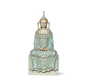 A Porcelain Guanyin Statue