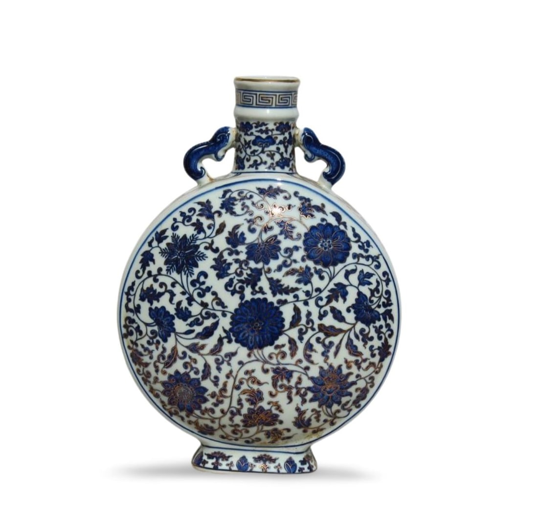 A Blue and White Moonflask Vase: A Blue and White Moonflask Vase. Dimension: 10" x 13.75".