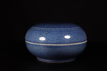 A Blue and Red Container with Lid